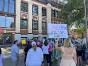 Community members attend a rally in June calling for the resignation of Newberg-Dundee Superintendent Stephen Phillips.