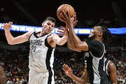 LAS VEGAS, NEVADA - JULY 13: Donovan Clingan #23 of the Portland Trail Blazers and Stephon Castle #5 of the San Antonio Spurs battle for a rebound in the second half of a 2024 NBA Summer League game at the Thomas & Mack Center on July 13, 2024 in Las Vegas, Nevada. The Spurs defeated the Trail Blazers 83-77. NOTE TO USER: User expressly acknowledges and agrees that, by downloading and or using this photograph, User is consenting to the terms and conditions of the Getty Images License Agreement. (Photo by Candice Ward/Getty Images)