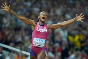 FILE - Sha'Carri Richardson, of the United States, celebrates after winning the gold medal in the final of the Women's 100-meters during the World Athletics Championships in Budapest, Hungary, Aug. 21, 2023. (AP Photo/Petr David Josek, File)