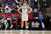 LAS VEGAS, NEVADA - JULY 13: Donovan Clingan #23 of the Portland Trail Blazers looks on against the San Antonio Spurs in the first half of a 2024 NBA Summer League game at the Thomas & Mack Center on July 13, 2024 in Las Vegas, Nevada. The Spurs defeated the Trail Blazers 83-77. NOTE TO USER: User expressly acknowledges and agrees that, by downloading and or using this photograph, User is consenting to the terms and conditions of the Getty Images License Agreement. (Photo by Candice Ward/Getty Images)