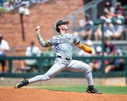 Oregon pitcher RJ Gordon delivers a pitch against Texas A&M in Game 1 of the Bryan-College Station Super Regional on Saturday, June 8, 2024, at Blue Bell Park. Texas A&M won 10-6.