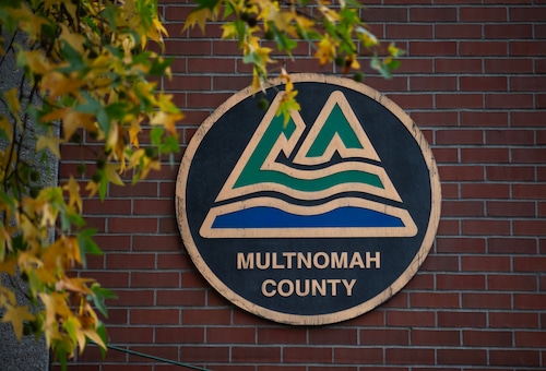 A sign that reads "multnomah county"