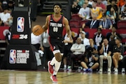 Portland Trail Blazers' Scoot Henderson drives up the court against the Houston Rockets during the second half of an NBA summer league basketball game Friday, July 7, 2023, in Las Vegas. (AP Photo/John Locher) AP