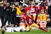 San Francisco 49ers cornerback Deommodore Lenoir (2) reacts after Detroit Lions wide receiver Josh Reynolds (8) dropped a pass during the NFC Championship game at Levi’s Stadium in Santa Clara, Calif. on Sunday, Jan. 28, 2024.