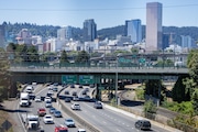 Cars move along Interstate 84 through Northeast Portland, Oregon on Tuesday, July 16, 2024. Graffiti was recently removed from the Martin Luther King, Jr. Blvd overpass.