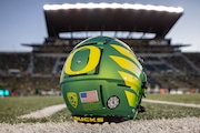 EUGENE, OREGON - NOVEMBER 24: An Oregon Ducks helmet on the field at Autzen Stadium before the football game between the Oregon Ducks and the Oregon State Beavers at Autzen Stadium  November 24, 2023 in Eugene, Oregon. (Photo by Tom Hauck/Getty Images)