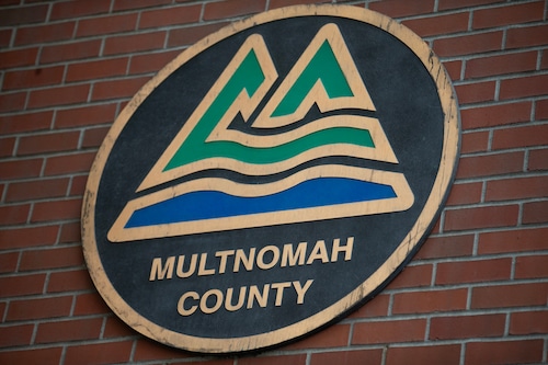 A sign that reads "multnomah county"