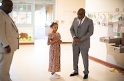 Gary Hollands, Portland Public Schools board chair and Herman Greene, Portland Public Schools vice board chair chat with student Amara Howe-Sadruddin. Greene and Hollands have both focused on improving academic skills and scores for students of color, but new testing data suggests that a disjointed school year took a toll this year, especially on math learning. More data is needed to give a fuller picture of student learning, district officials say.