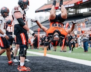 Oregon State running back Dyontae Navarrete (29) flips after scoreing a touchdown during the Beavers spring showcase football game on April 20, 2024, at Reser Stadium in Corvallis.