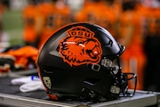 The Oregon State Beavers wore throwback black and orange helmets for their game against the Washington State Cougars at Reser Stadium in Corvallis, Oregon on Saturday, Oct. 15, 2022. 