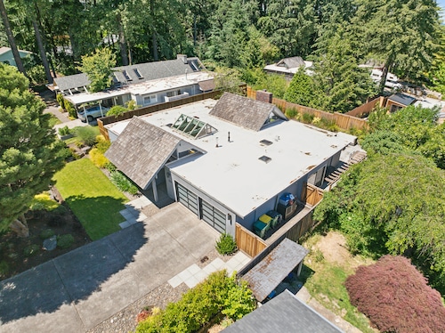 A 1971 Robert Rummer-built house at 13125 S.W. Heather Court in Beaverton is for sale at $1.2 million by James DeMarco and LuAnne Dindia DeMarco of Investors Trust Realty. 360PDX