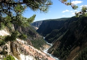 FILE - The Grand Canyon of the Yellowstone is shown September 2009, in Yellowstone National Park, Wyo. Samson Lucas Bariah Fussner is accused of firing a semiautomatic rifle at the entrance of a Yellowstone National Park dining facility with some 200 people inside on Thursday, July 4, 2024. Before the shooting, Yellowstone National Park rangers said Fussner held a woman at gunpoint at a residence near the Grand Canyon of the Yellowstone. (AP Photo/Beth Harpaz, File)