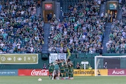 The Portland Timbers’ starting 11 gather on the field before an MLS match against the San Jose Earthquakes at Providence Park in Portland, Oregon on Wednesday, May 15, 2024.