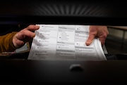 Election workers sort ballots at the Multnomah County Elections Division building on SE Morrison St. on Mon., May 20, 2024.