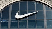 A Nike logo hangs on the front of a store at The Grove mall in Los Angeles on April 9, 2023.