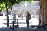 People made use of a misting tent outside of Blanchet House in downtown Portland as a record-setting heat wave continued on Mon., July 8, 2024.