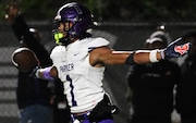 Parker's Na'eem Offord celebrates his second-quarter touchdown against Mountain Brook in Mountain Brook, Ala., Friday, Oct. 13, 2023.  (Mark Almond | preps@al.com)