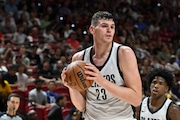 LAS VEGAS, NEVADA - JULY 13: Donovan Clingan #23 of the Portland Trail Blazers grabs a rebound against the San Antonio Spurs in the second half of a 2024 NBA Summer League game at the Thomas & Mack Center on July 13, 2024 in Las Vegas, Nevada. The Spurs defeated the Trail Blazers 83-77. NOTE TO USER: User expressly acknowledges and agrees that, by downloading and or using this photograph, User is consenting to the terms and conditions of the Getty Images License Agreement. (Photo by Candice Ward/Getty Images)