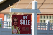 A for-sale sign stands outside a residence in Niles, Ill., Monday, July 1, 2024.