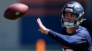 Denver Broncos rookie quarterback Bo Nix takes part in drills during practice at the NFL football team's training headquarters Thursday, May 23, 2024, in Centennial, Colo. (AP Photo/David Zalubowski)