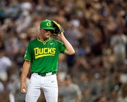 Oregon pitcher Brock Moore listens for a pitch call in game two of the Bryan-College Station Super Regional on Sunday, June 9, 2024, at Blue Bell Park.