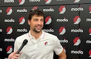 New Trail Blazers forward Deni Avdija talks to the media at the team's practice facility in Tualatin, Ore., nearly two weeks after being traded from the Washington Wizards. July 8, 2024.