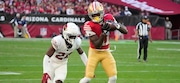 San Francisco 49ers wide receiver Brandon Aiyuk (11) hauls in a pass against the Arizona Cardinals during the first half of a game Sunday, Dec. 17, 2023, in Glendale, Ariz.