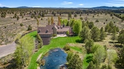 A 40-acre, gated estate near Bend, for sale at $3.6 million, has two outbuildings with heated finished spaces, concrete floors and endless possibilities under pitched ceilings.